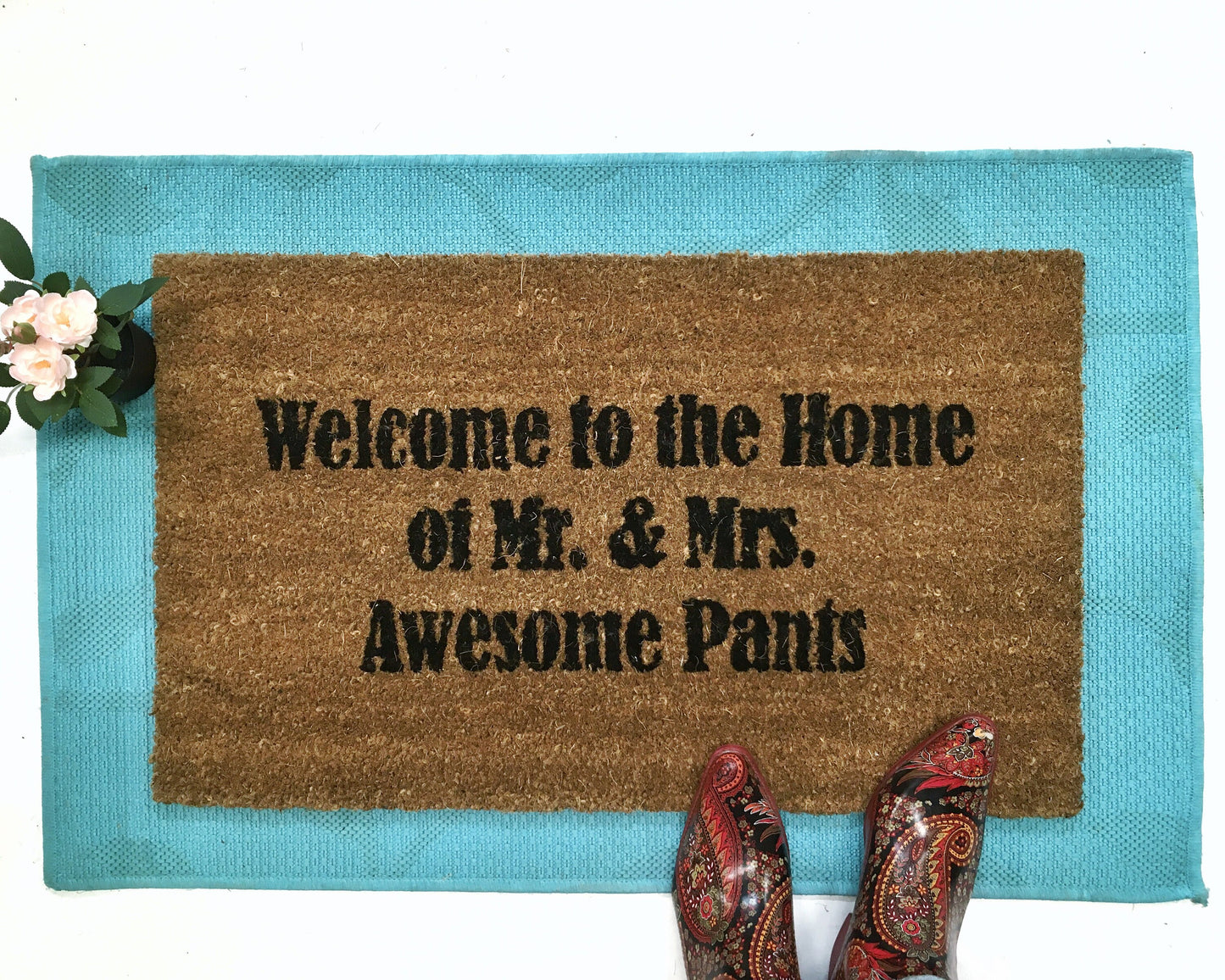 Promotional graphic for an all natural, sustainable, eco-friendly coir doormat made by Damn GoodDoormats