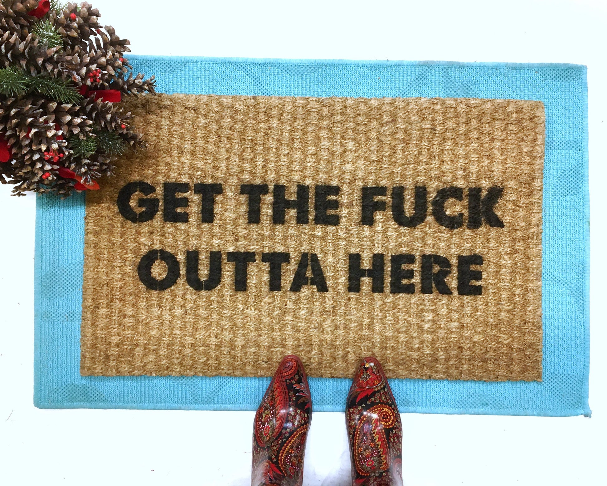 Promotional graphic for an all natural, sustainable, eco-friendly coir doormat made by Damn GoodDoormats