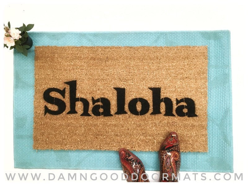 Promotional graphic for an all natural, sustainable, eco-friendly coir doormat made by Damn GoodDoormats