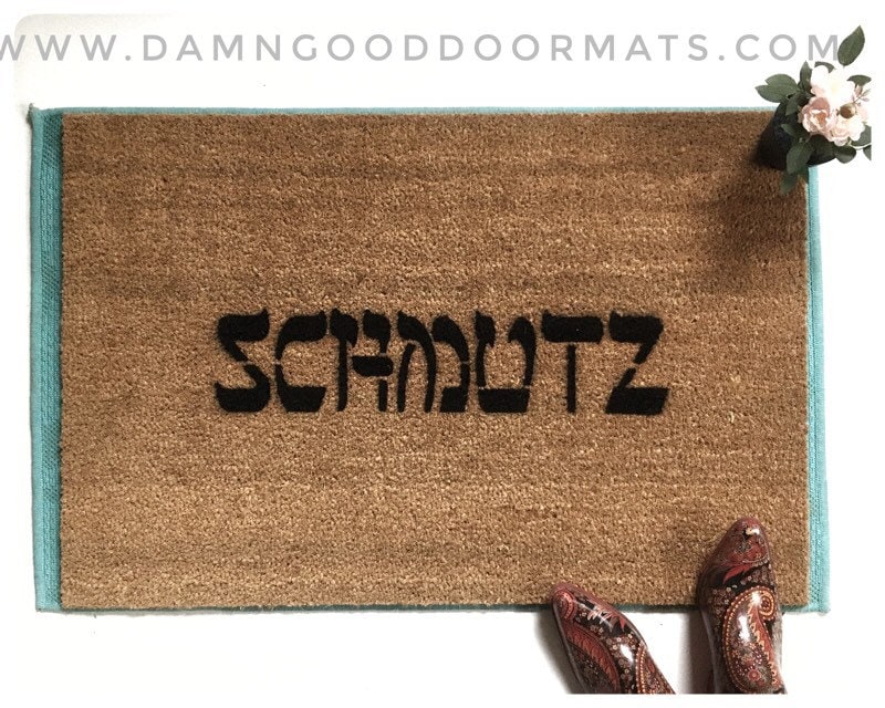 Promotional graphic for an all natural, sustainable, eco-friendly coir doormat made by Damn GoodDoormats