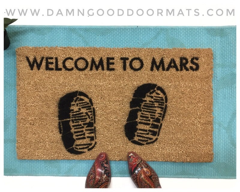 Promotional graphic for an all natural, sustainable, eco-friendly coir doormat made by Damn GoodDoormats