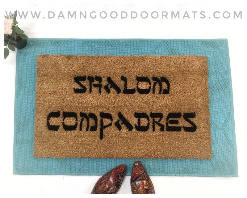 Promotional graphic for an all natural, sustainable, eco-friendly coir doormat made by Damn GoodDoormats