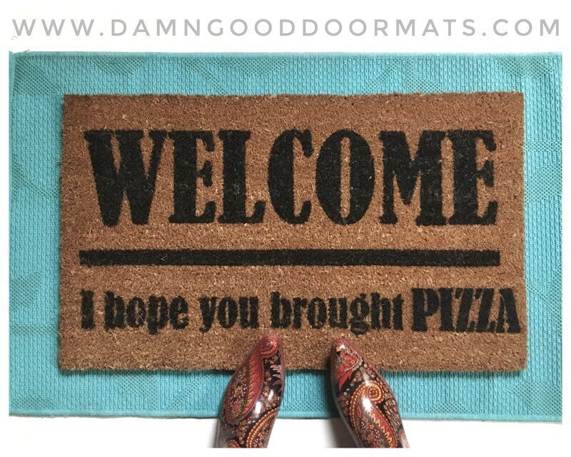 Promotional graphic for an all natural, sustainable, eco-friendly coir doormat made by Damn GoodDoormats