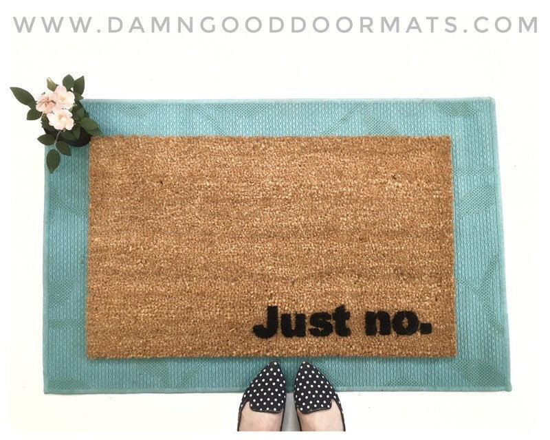 Promotional graphic for an all natural, sustainable, eco-friendly coir doormat made by Damn GoodDoormats