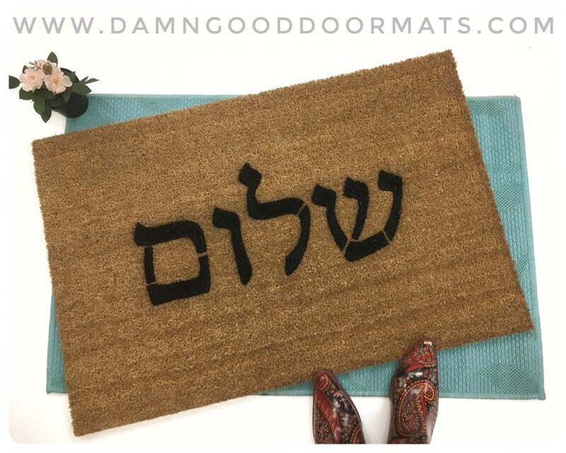 Promotional graphic for an all natural, sustainable, eco-friendly coir doormat made by Damn GoodDoormats