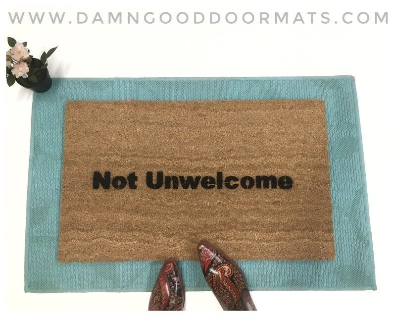 Promotional graphic for an all natural, sustainable, eco-friendly coir doormat made by Damn GoodDoormats