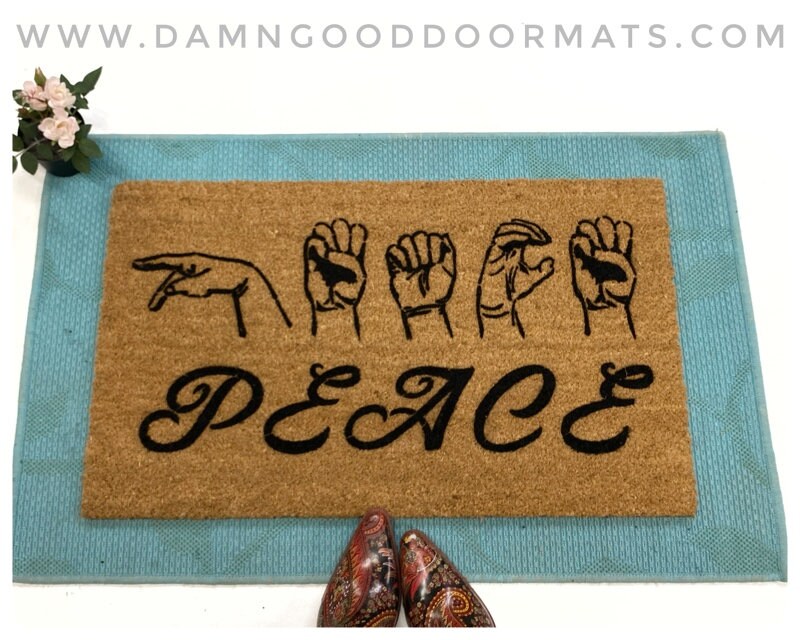 Promotional graphic for an all natural, sustainable, eco-friendly coir doormat made by Damn GoodDoormats