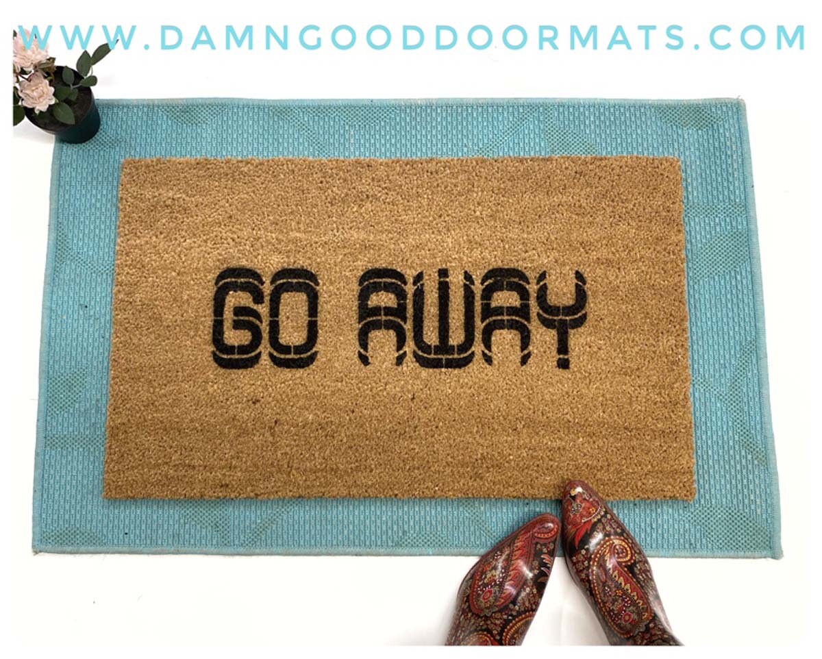 Promotional graphic for an all natural, sustainable, eco-friendly coir doormat made by Damn GoodDoormats