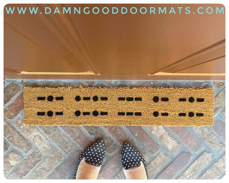 Promotional graphic for an all natural, sustainable, eco-friendly coir doormat made by Damn GoodDoormats