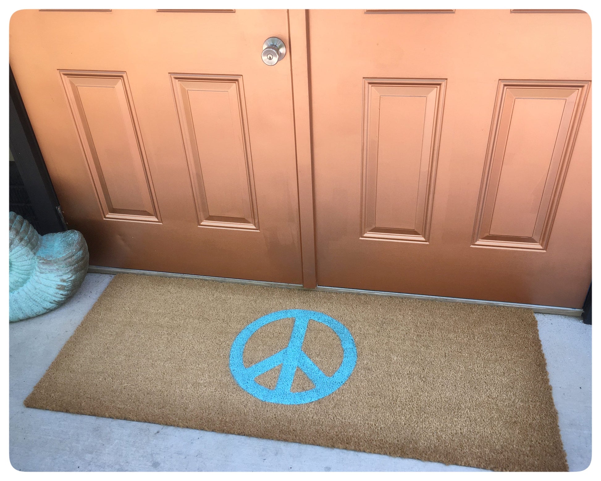 Promotional graphic for an all natural, sustainable, eco-friendly coir doormat made by Damn GoodDoormats