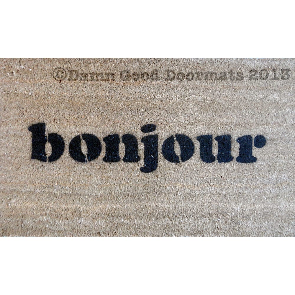 Promotional graphic for an all natural, sustainable, eco-friendly coir doormat made by Damn GoodDoormats