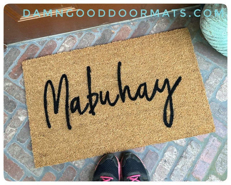 Promotional graphic for an all natural, sustainable, eco-friendly coir doormat made by Damn GoodDoormats