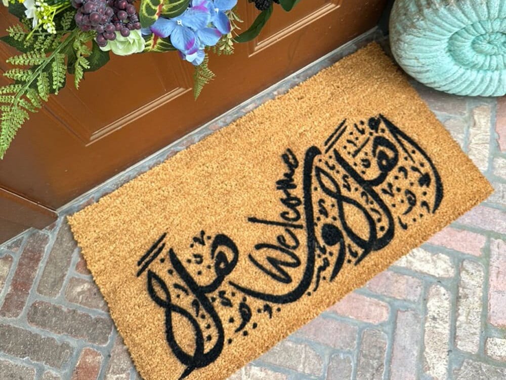 Promotional graphic for arabic all natural, sustainable, eco-friendly coir doormat made by Damn GoodDoormats