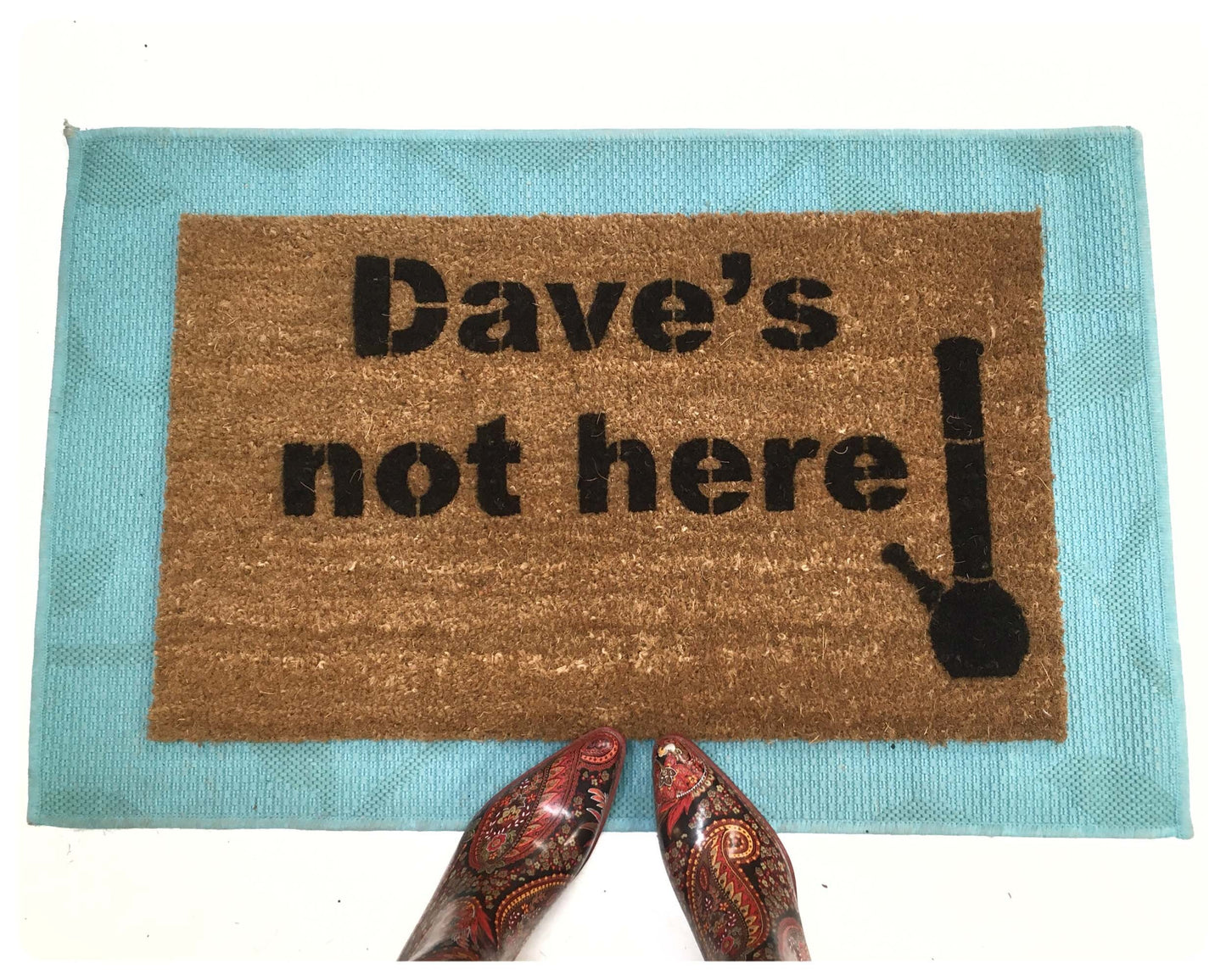 Promotional graphic for an all natural, sustainable, eco-friendly coir doormat  reading &quot;Dave&#39;s not here&quot; with a bong made by Damn GoodDoormats