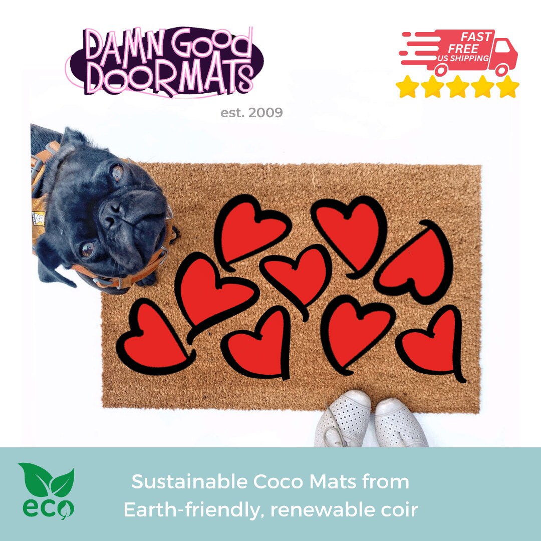 Promotional graphic for VALENTINES DAY HEART doormats by Damn GoodDoormats