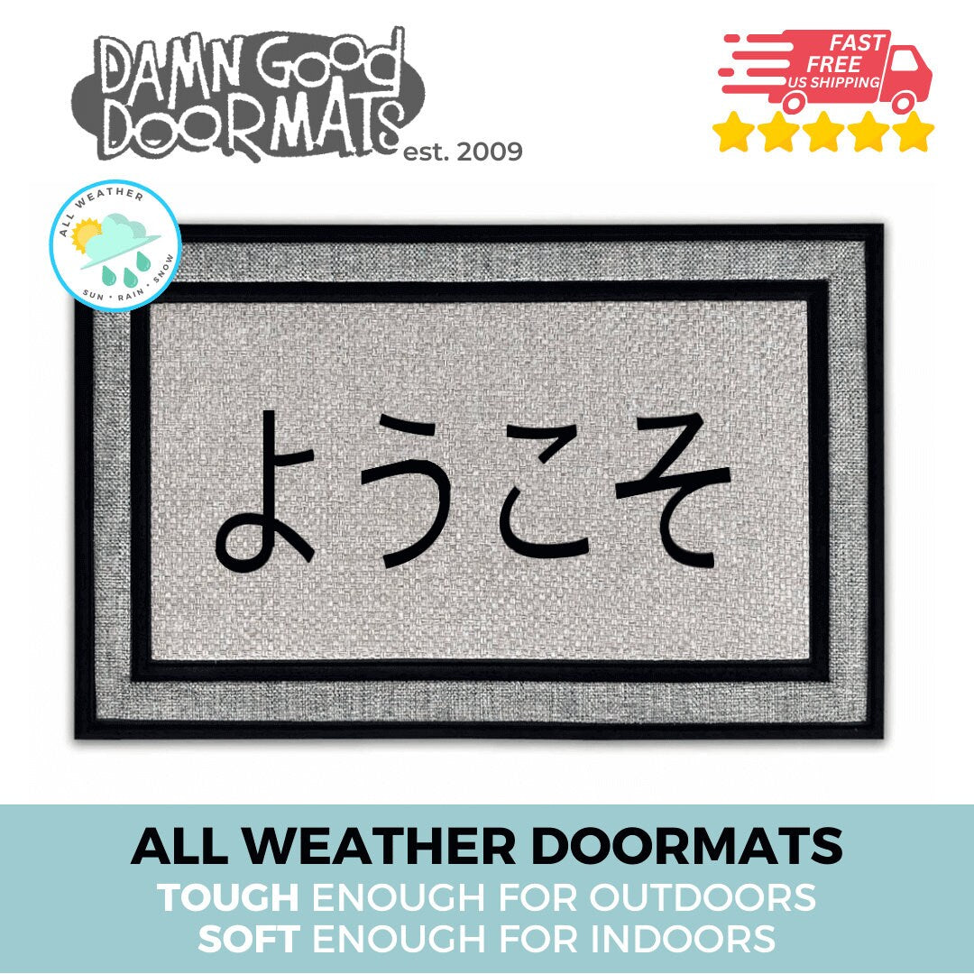 Promotional graphic for an all weather,  eco-friendly coir doormat made by Damn GoodDoormats reading Welcome in Japanese Yokoso