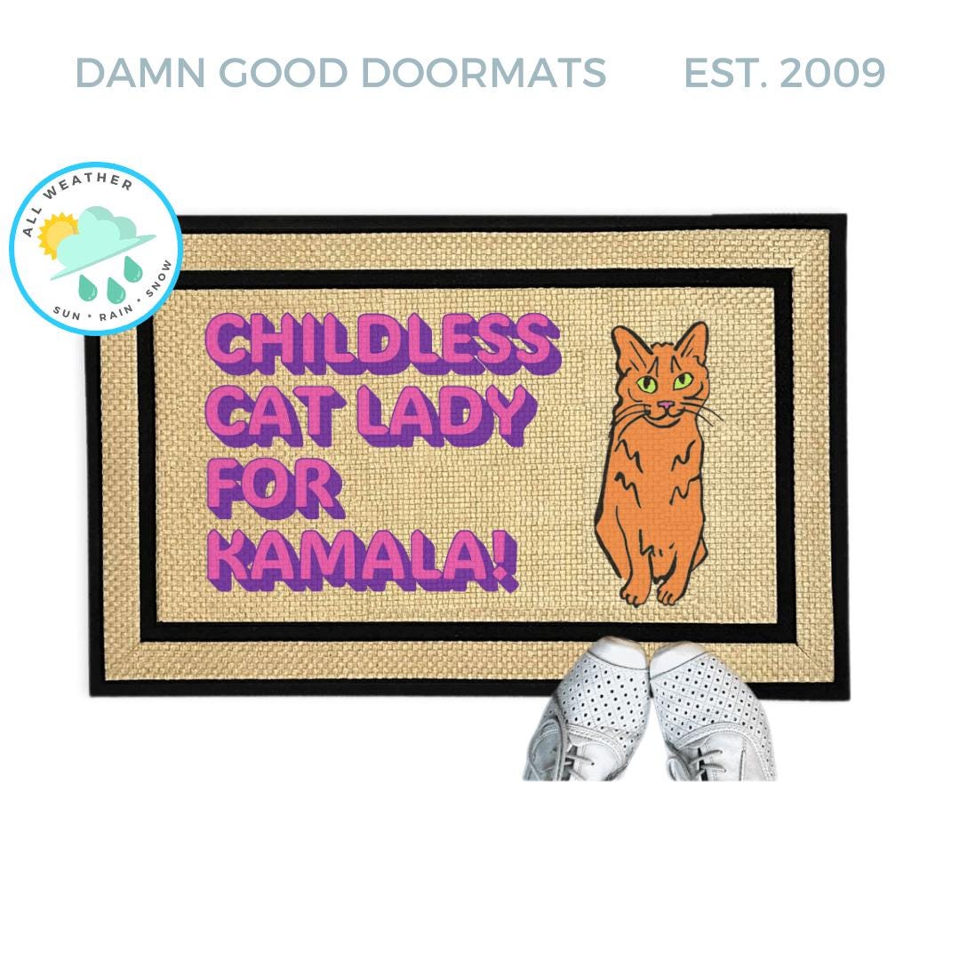 a door mat with a picture of a cat on it